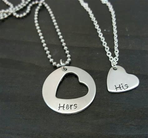 his and hers jewelry|matching his and her necklaces.